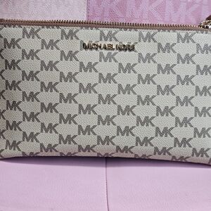 Michael Kors Monogram Beige and Brown Clutch